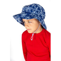 side view of boy wearing the Swim Hat STARFISH
    		