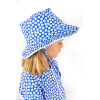 side view of girl wearing the Blue Daisy Swim Hat
    		