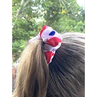 Close up of girl's ponytail wearing scrunchie
    		